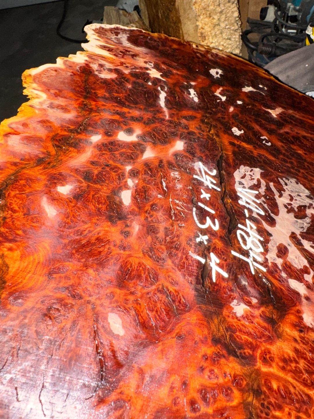 Vasticola burl closeup, glossy finish highlighting eye figure.