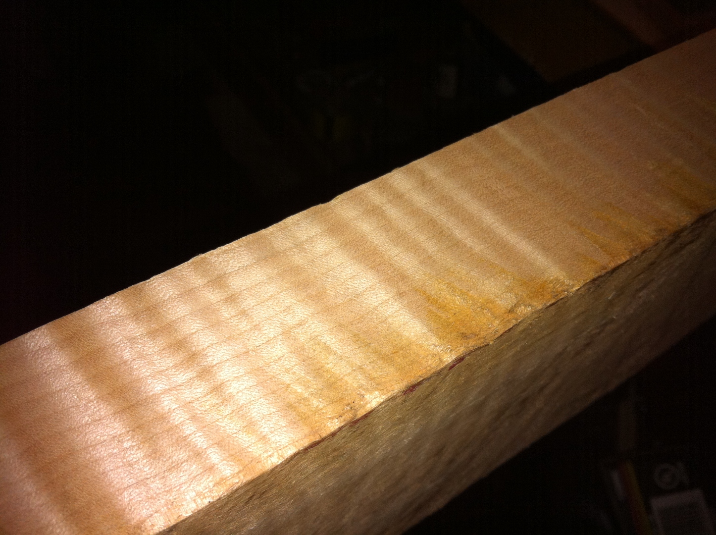 Stack of figured walnut boards waiting for a project.